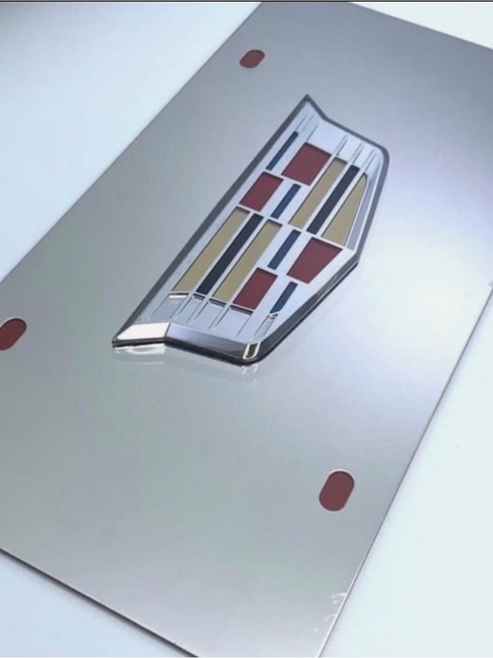 Cadillac plate